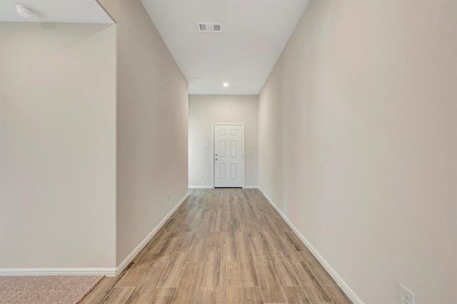 Spacious, unfurnished interior of a new home in The Preserve, Justin (Image 40).