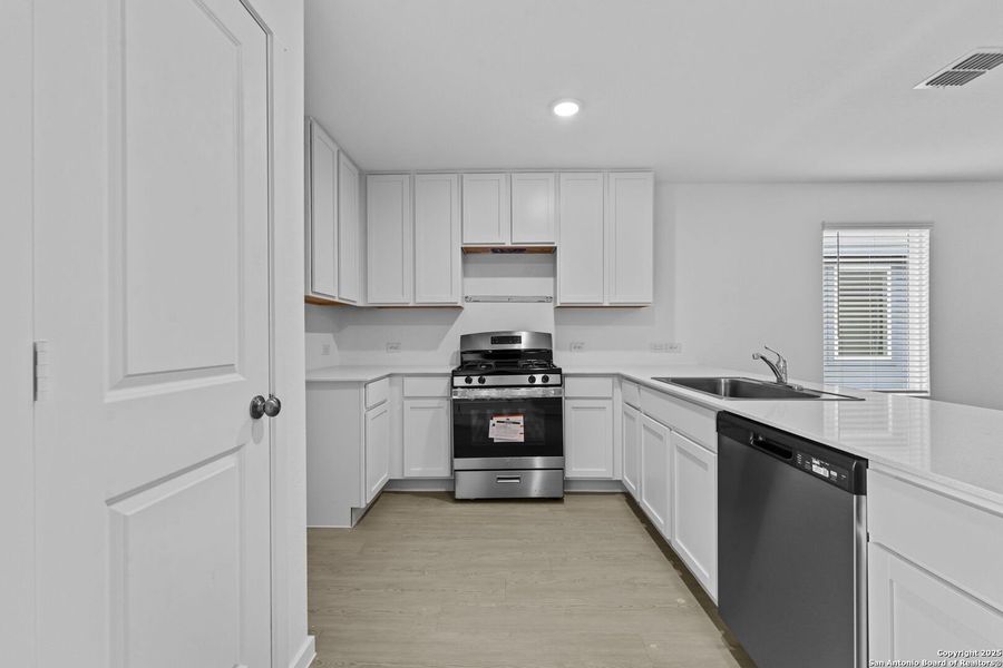 Furnished interior view inside a new home in Torian Village: Belmar Collection, San Antonio (Image 7).