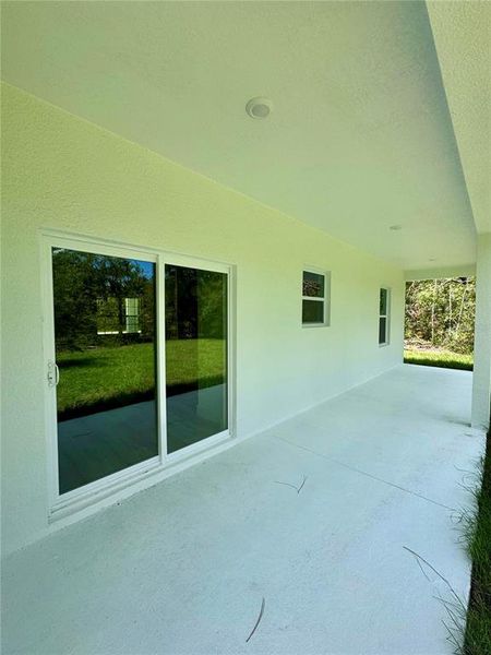Exterior details and patio area of a home in , Citrus Springs (Image 17).