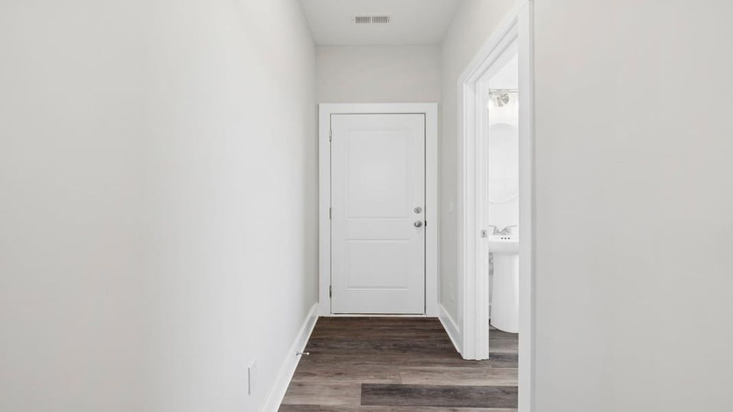 Representative unfurnished interior of a home built from the Phoenix by D.R. Horton in Edgewood Estates, Greenville (Image 16).