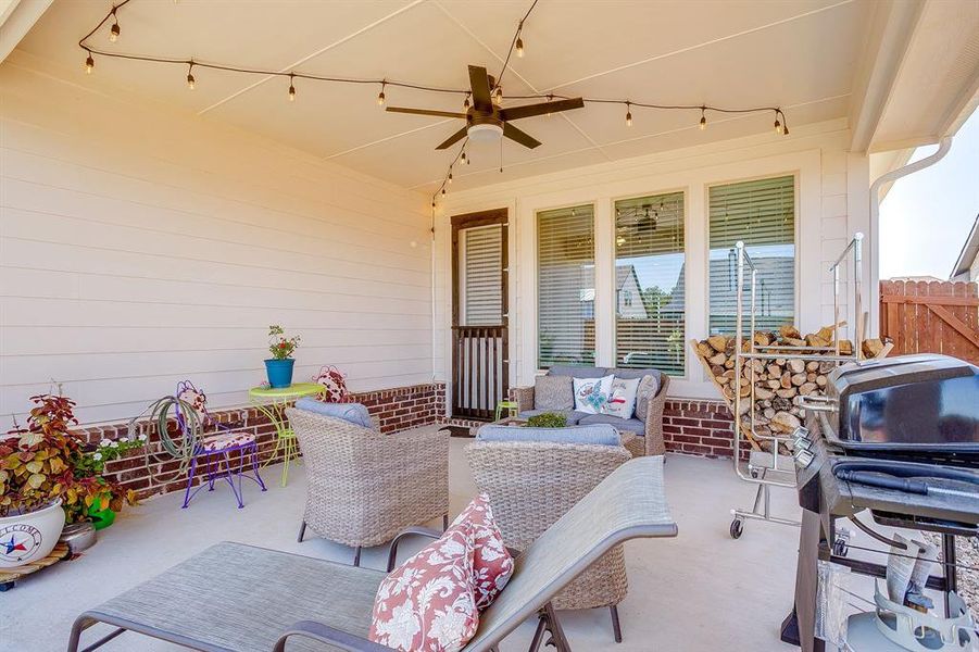 View of patio / terrace featuring an outdoor hangout area and a ceiling fan View of patio / terrace featuring an outdoor hangout area and a ceiling fan