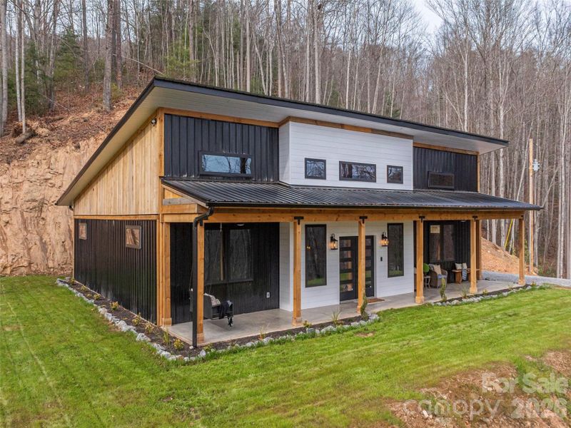 Exterior details and patio area of a home in , Waynesville (Image 22).