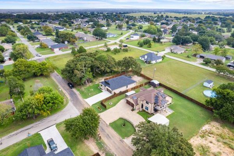 Aerial view of property's location featuring nearby suburban area Aerial view of property's location featuring nearby suburban area