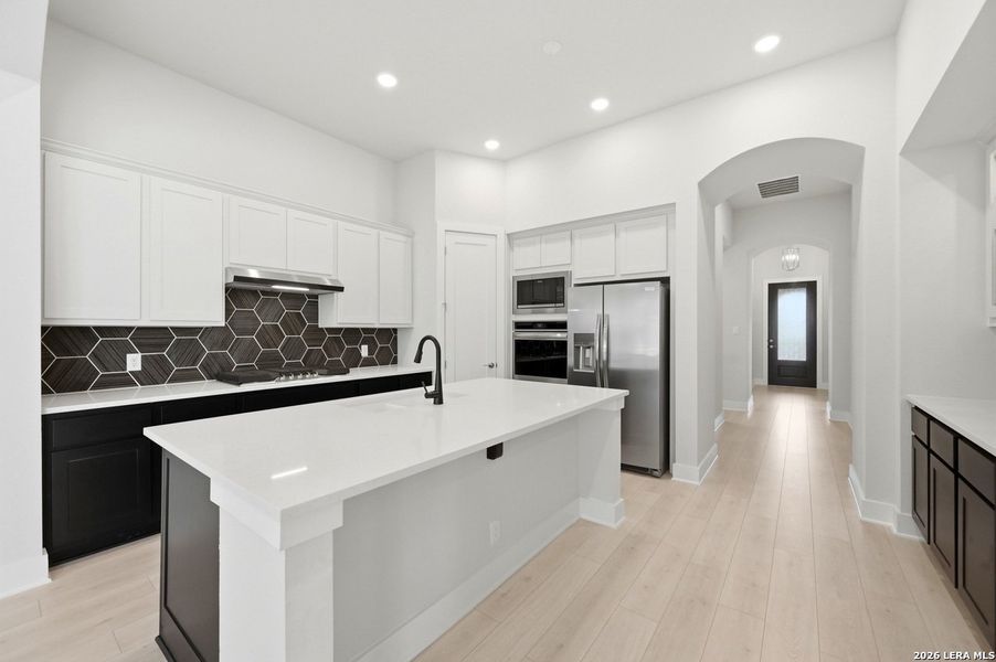 Furnished interior view inside a new home in Weston Oaks, San Antonio (Image 8).