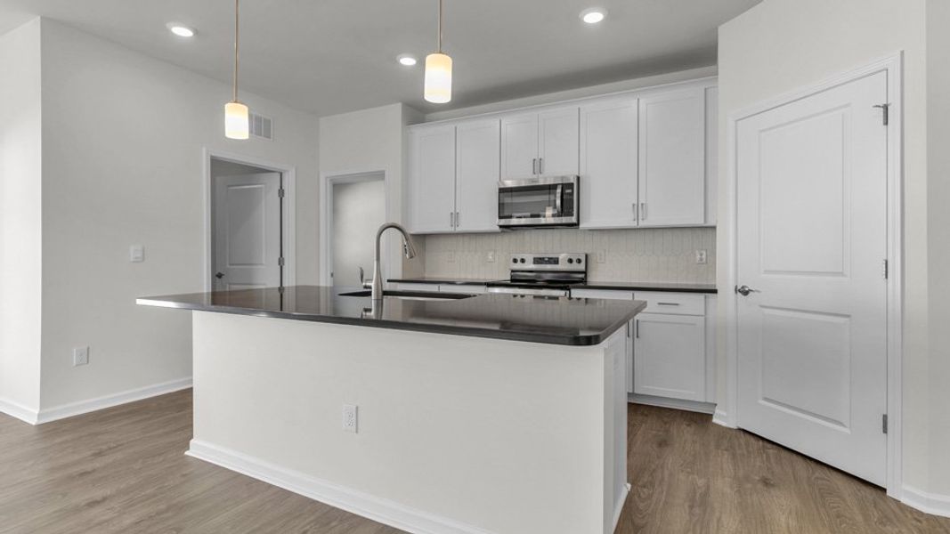 Representative furnished interior of a home built from the CLIFTON by D.R. Horton in The Villas at Galvins Ridge, Sanford (Image 4). Representative furnished interior of a home built from the CLIFTON by D.R. Horton in The Villas at Galvins Ridge, Sanford (Image 4).