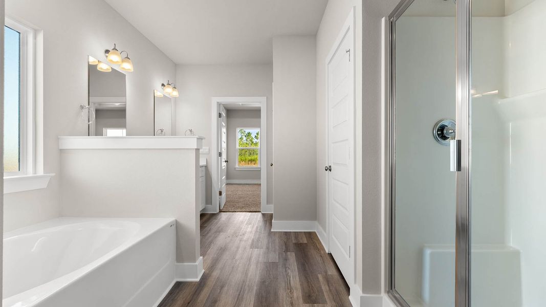 Representative furnished interior of a home built from the The Mckenzie by D.R. Horton in Liberty, Panama City (Image 10).