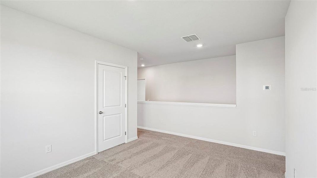 Spacious, unfurnished interior of a new home in Bella Lago, Parrish (Image 24).