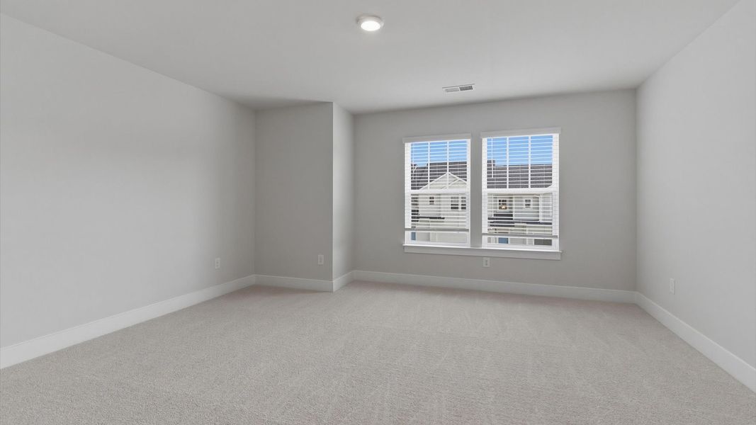 First-class bedroom with generous proportions, a walk-in closet, and beautiful natural light through large windows First-class bedroom with generous proportions, a walk-in closet, and beautiful natural light through large windows