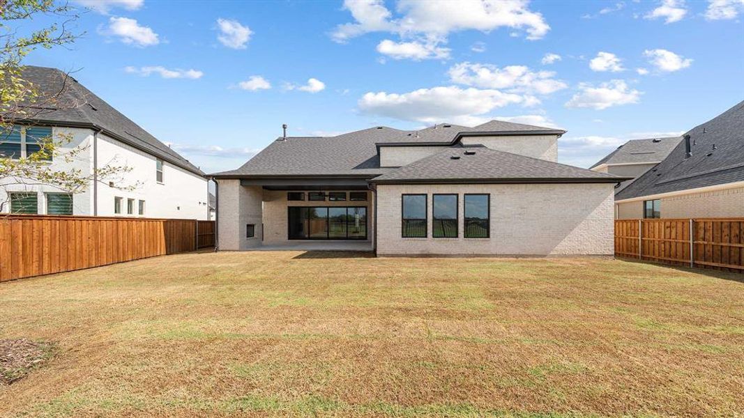 Exterior details and patio area of a home in The Tribute 60', The Colony (Image 2). Exterior details and patio area of a home in The Tribute 60', The Colony (Image 2).