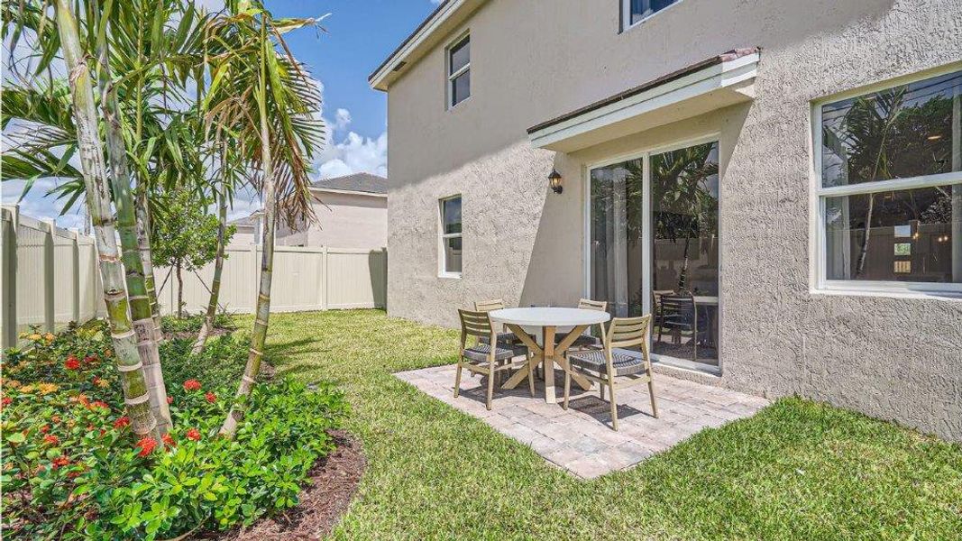 Representative exterior photo of a completed home built from the Grandcourt by D.R. Horton in Parker Pointe, Homestead, FL (Image 21).