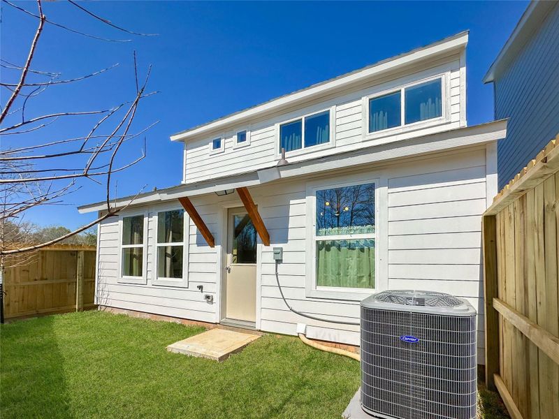 Exterior details and patio area of a home in , Conroe (Image 21).