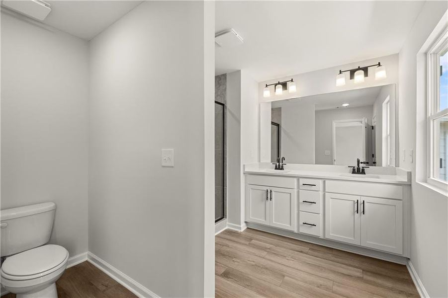Furnished interior view inside a new home in The Bluffs, Canton (Image 10).