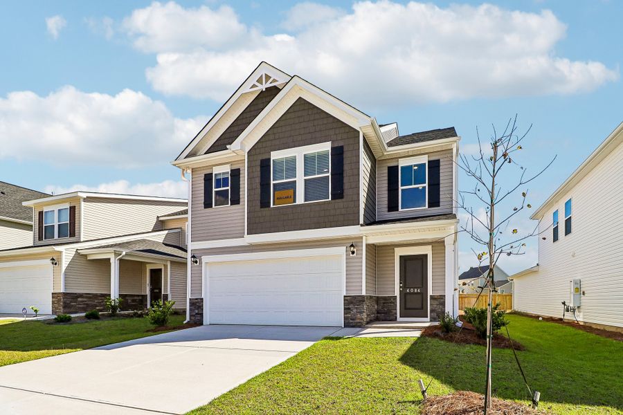 Front exterior of a new home in Victorywoods Village, Columbia, SC, highlighting curb appeal (Image 19).