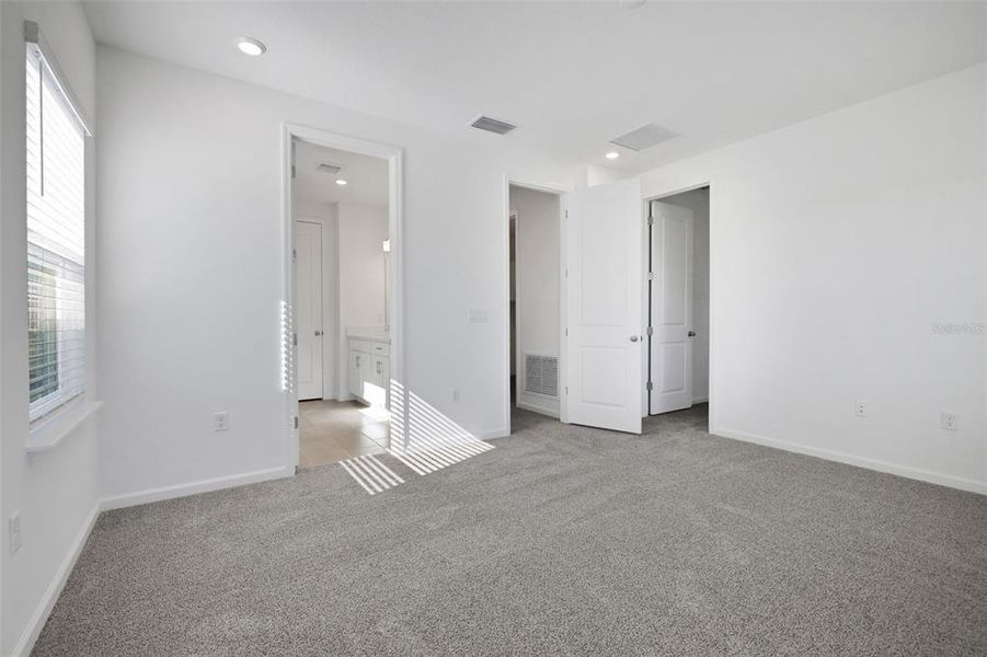 Spacious, unfurnished interior of a new home in Serenade at Ovation, Winter Garden (Image 23).