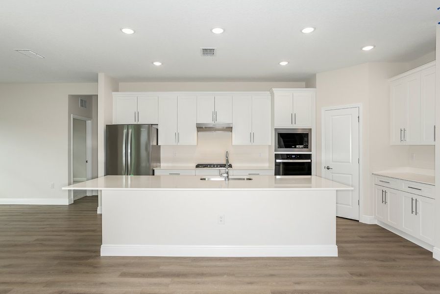 Furnished interior view inside a new home in Pasadena Woods, Dade City (Image 7).