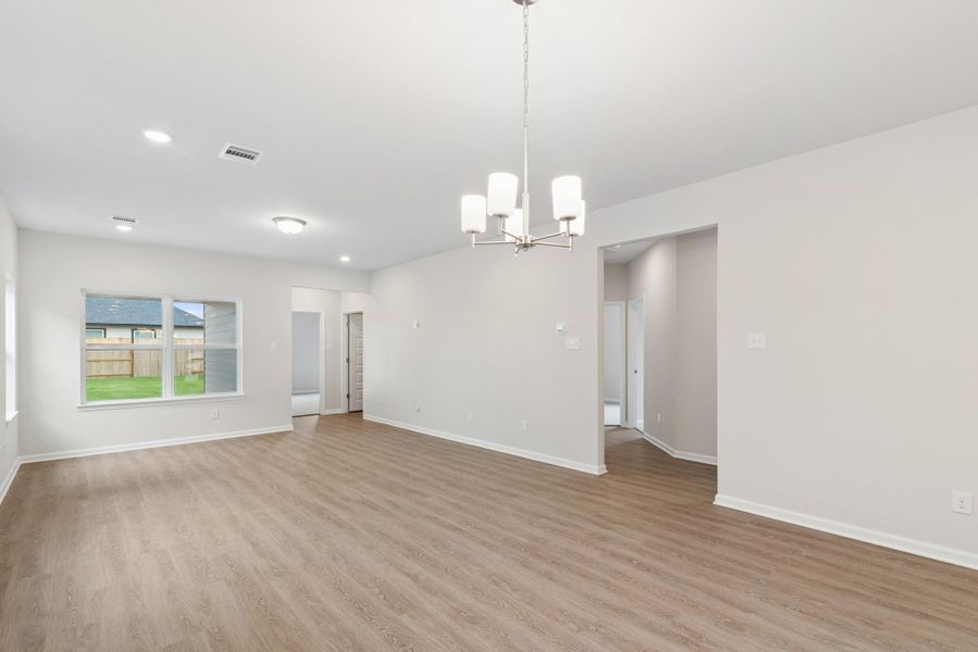 The Oakshire II- Family Room into Secondary Bedrooms Hallway. Sample image for illustration; upgrades, options, and colors may vary. The Oakshire II- Family Room into Secondary Bedrooms Hallway. Sample image for illustration; upgrades, options, and colors may vary.