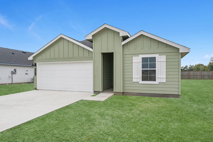Front exterior of a new home in Reserve at Mallard Lakes, Orange, TX, highlighting curb appeal (Image 2). Front exterior of a new home in Reserve at Mallard Lakes, Orange, TX, highlighting curb appeal (Image 2).