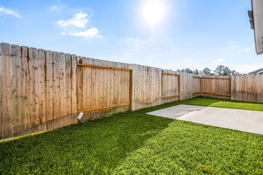 Exterior details and patio area of a home in Northpark South, Porter (Image 24).