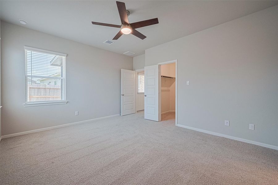 Spacious, unfurnished interior of a new home in Sunterra, Katy (Image 16).