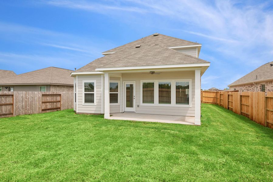 Front exterior of a new home in Miller's Pond, Rosenberg, TX, highlighting curb appeal (Image 16).