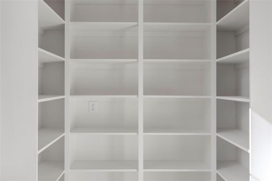 Large walk in pantry with plenty of storage