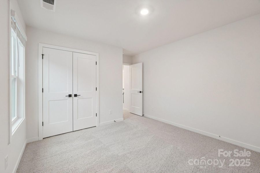 Spacious, unfurnished interior of a new home in Oak Grove Hill, Huntersville (Image 20).