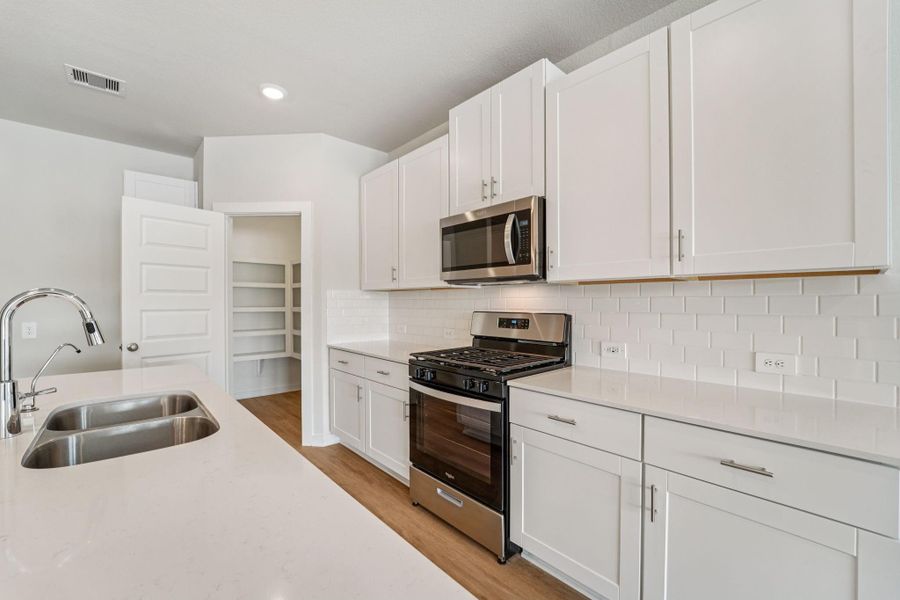 Photo is not of the actual home, but is an inspirational photo of builder’s model home and may depict options, furnishings, and/or decorator features that are not included Photo is not of the actual home, but is an inspirational photo of builder’s model home and may depict options, furnishings, and/or decorator features that are not included