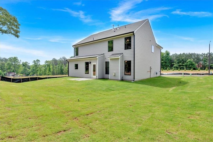 Exterior details and patio area of a home in The Overlook at Factory Shoals, Mableton (Image 2).