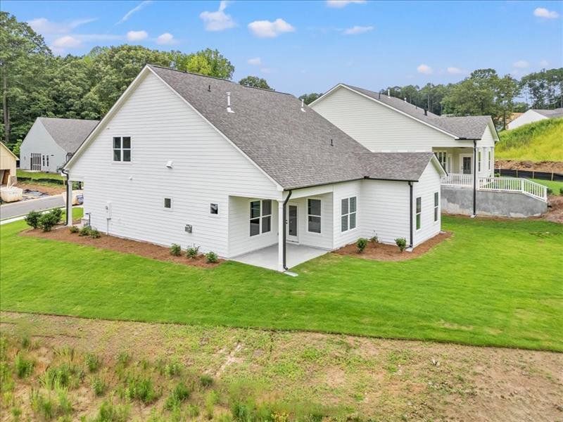 Front exterior of a new home in Cooks Farm, Woodstock, GA, highlighting curb appeal (Image 29).
