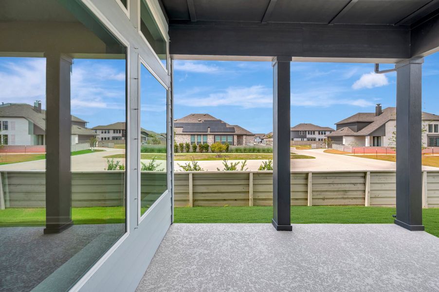 Exterior details and patio area of a home in Pomona - Grove Row Collection, Manvel (Image 4).