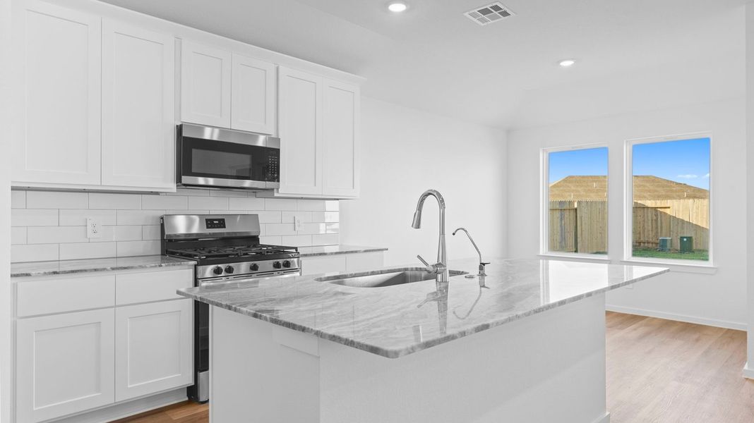 Furnished interior view inside a new home in Caldwell Crossing, Iowa Colony (Image 5). Furnished interior view inside a new home in Caldwell Crossing, Iowa Colony (Image 5).