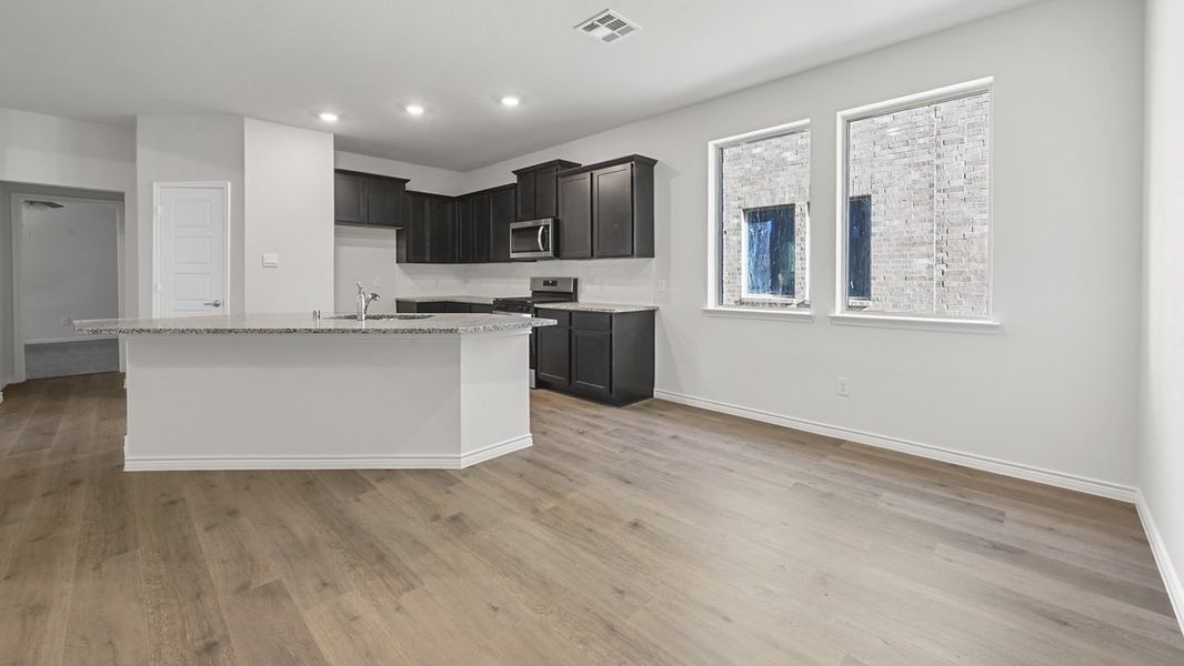 Representative furnished interior of a home built from the Chester by D.R. Horton in The Woods at Lindsey Place, Anna (Image 2).