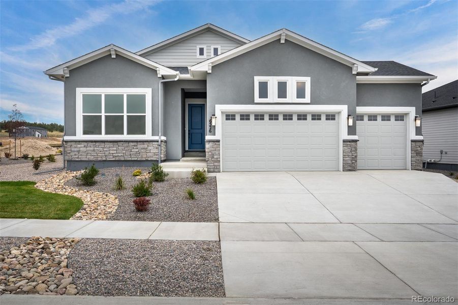 Front exterior of a home in the Wolf Ranch - Enclave Collection community, located in Colorado Springs, CO (Image 15).