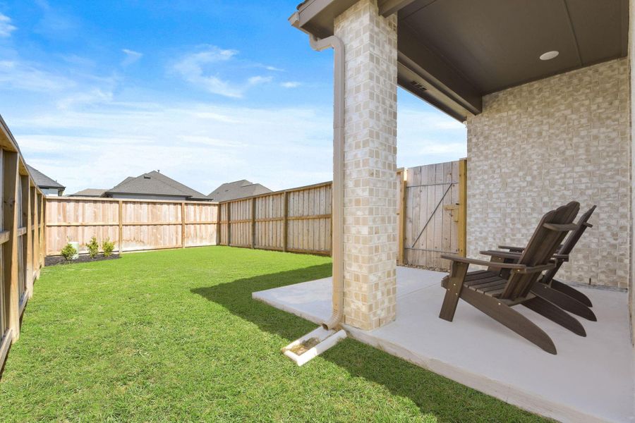 Exterior details and patio area of a home in Riceland: 42ft. lots, Mont Belvieu (Image 3).