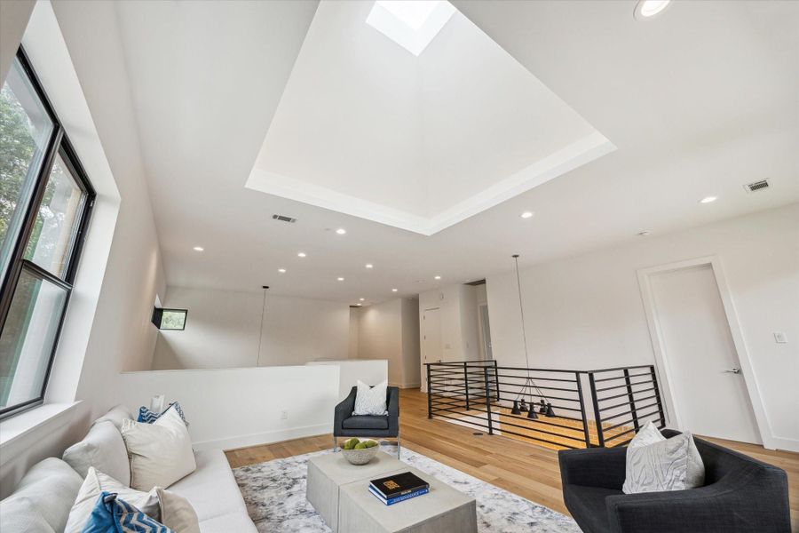 Skylight activates the entire house with light and showcase views inside and out.