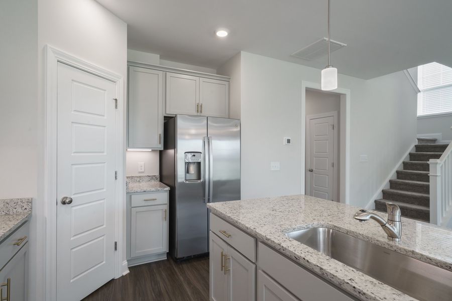 Representative furnished interior of a home built from the The Calle by Cothran Homes in Holly Ridge, Greenville (Image 6). Representative furnished interior of a home built from the The Calle by Cothran Homes in Holly Ridge, Greenville (Image 6).