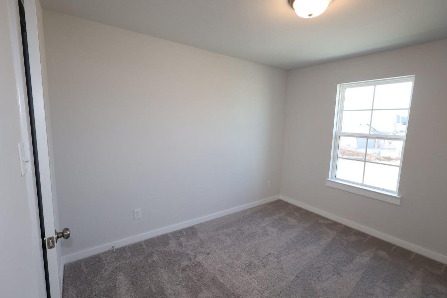 Spacious, unfurnished interior of a new home in Mason Woods, Cypress (Image 21).