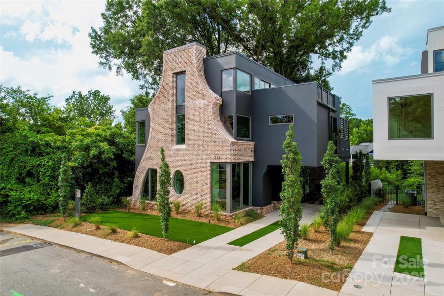 Front exterior of a new home in , Charlotte, NC, highlighting curb appeal (Image 22).