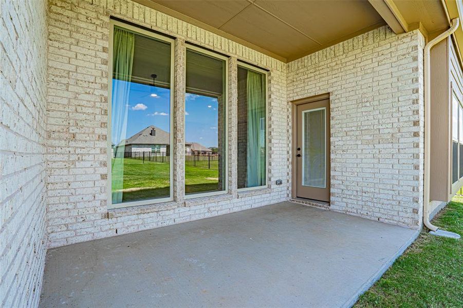 Front exterior of a new home in Abe's Landing, Granbury, TX, highlighting curb appeal (Image 22). Front exterior of a new home in Abe's Landing, Granbury, TX, highlighting curb appeal (Image 22).