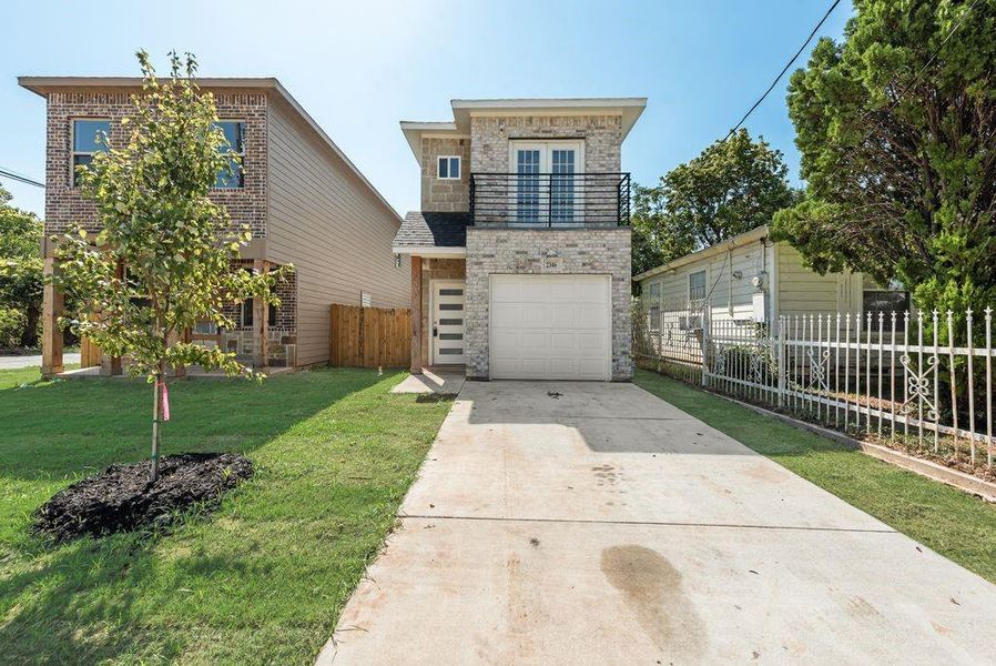 Front exterior of a new home in , Dallas, TX, highlighting curb appeal (Image 16).