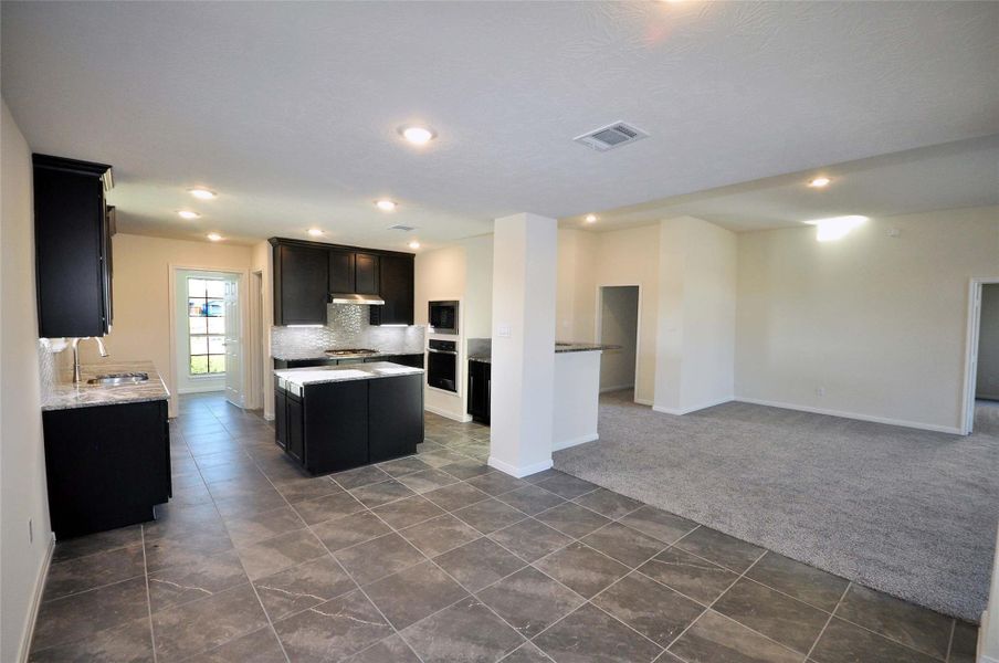 Furnished interior view inside a new home in Pedregal, League City (Image 6).