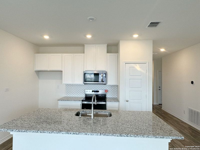 Furnished interior view inside a new home in Hidden Bluffs at TRP, San Antonio (Image 5). Furnished interior view inside a new home in Hidden Bluffs at TRP, San Antonio (Image 5).