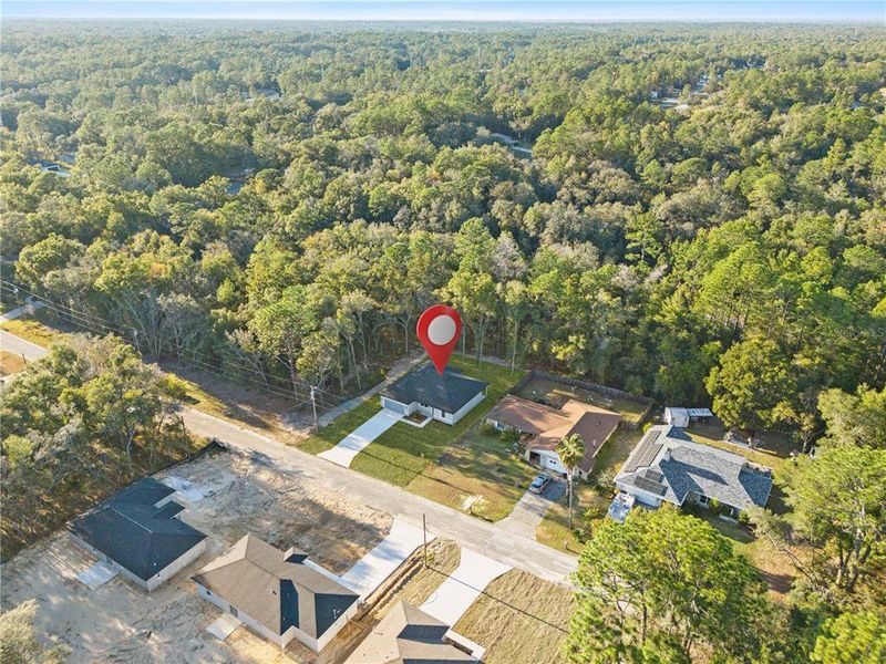 Front exterior of a new home in , Citrus Springs, FL, highlighting curb appeal (Image 22).