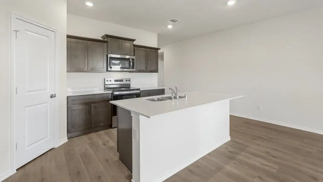 Furnished interior view inside a new home in Valor Farms, Royse City (Image 4).