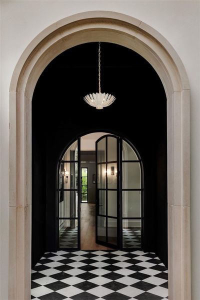 An elegant entry anchored by natural materials sets the tone for what awaits, light, proportion, and craftsmanship at every turn. An elegant entry anchored by natural materials sets the tone for what awaits, light, proportion, and craftsmanship at every turn.