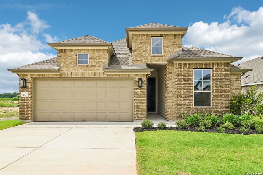 Front exterior of a new home in Stream Waters, Seguin, TX, highlighting curb appeal (Image 20). Front exterior of a new home in Stream Waters, Seguin, TX, highlighting curb appeal (Image 20).