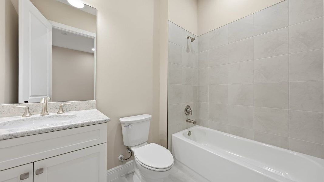 Furnished interior view inside a new home in PGA Village Verano, Port St. Lucie (Image 14).