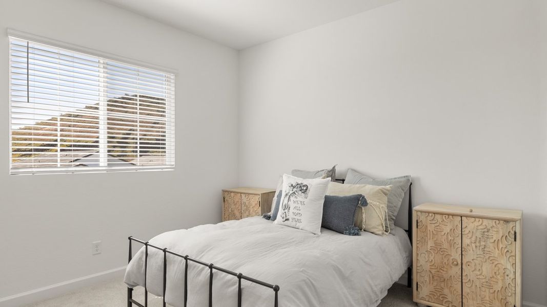 Representative furnished interior of a home built from the Crow by D.R. Horton in Apache Farms, Buckeye (Image 33).