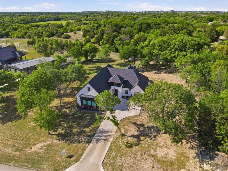 Front exterior of a new home in , Azle, TX, highlighting curb appeal (Image 22). Front exterior of a new home in , Azle, TX, highlighting curb appeal (Image 22).