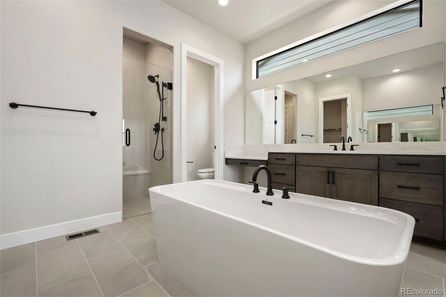 Furnished interior view inside a new home in The Fairways at RainDance, Windsor (Image 5).